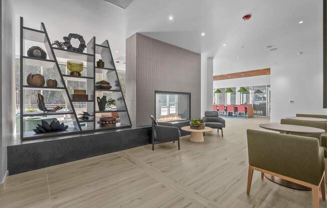 A modern dining area with a wooden floor and a glass display cabinet.
