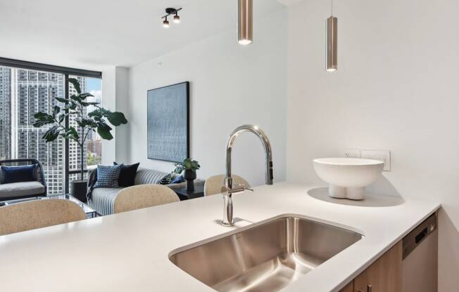 a kitchen with a sink and a window at Cassidy on Canal, Chicago, IL