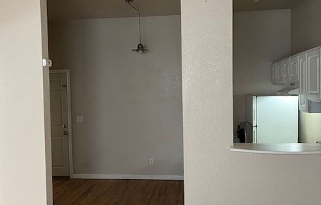 PRICED REDUCED!! Large windows and exposed brick wall