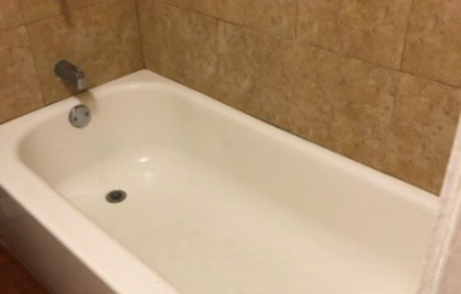 All Tile Throughout the Unit, One Story Patio Home, Minutes Away From UCF, Technology Park, & the E/W Expressway