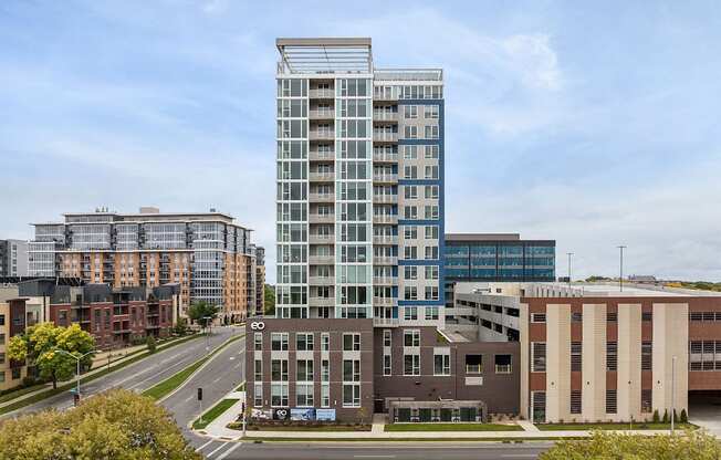 a view of a tall building from a city street