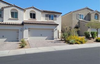 OUTSTANDING HENDERSON TOWNHOME IN GATED COMMUNITY!