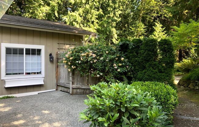 New Adjusted Price for this Charming oversized one bedroom cottage nestled quietly among a beautiful Bainbridge oasis