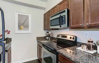 Fully Furnished Kitchen With Stainless Steel Appliances at Columbia Uptown, Washington