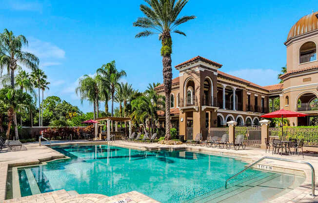 Resort pool with palm trees and Mediterranean architecture in St. Petersburg, Florida