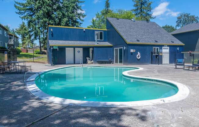 take a dip in the pool at the whispering winds apartments in pearland, tx