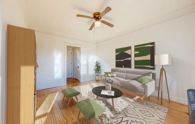 Living Area with Natural Restored Hardwood Flooring and Ceiling Fan at The Park Apartments in Minneapolis