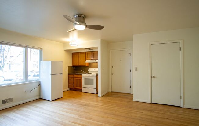 NW Coveted Corner Flat w Hardwood Floors Ready Late June!