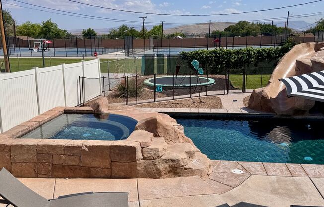 Stunning 7-Bedroom Home with Pool, EV-Ready Garage & Prime Location! $3500/mo  12 Month Lease