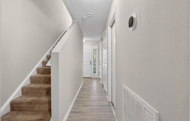 Spacious 3BR Townhome with Loft, Garage & Screened Patio