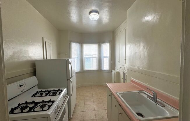 Great Deal!  Just 1 block from Campus!! ~Off-street, Parking available~ Coin Laundry Onsite