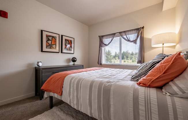 bedroom with large bed and window