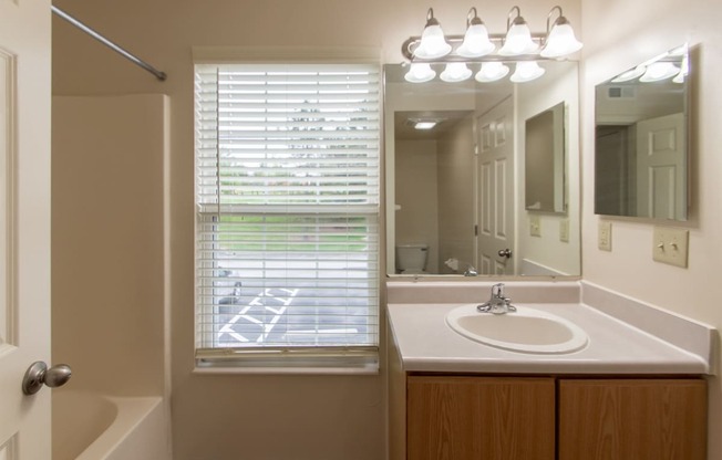 This is photo of the bathroom in the 852 square foot, 1 bedroom Fairlawn floor plan at Trails of Saddlebrook Apartments in Florence, KY.