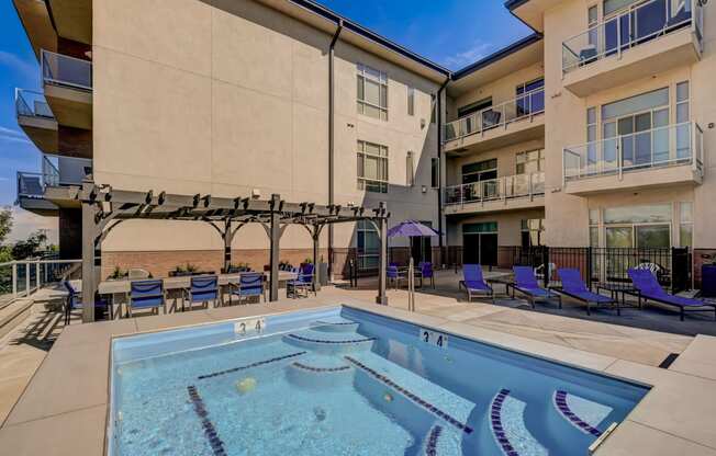 our apartments have a large pool and lounge chairs