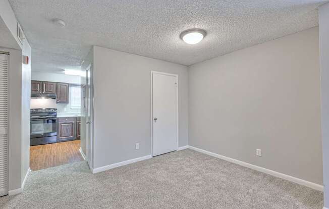A room with a carpeted floor and a ceiling light at Landmark at Lyncrest Reserve Apartments, Nashville, 37209