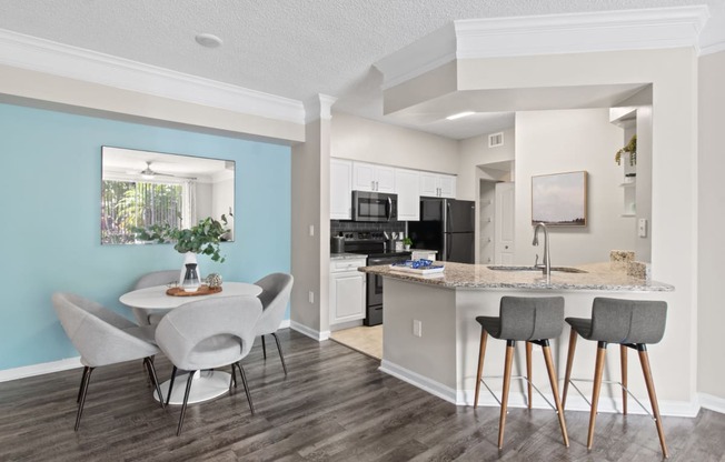 Kitchen and Dining Table at Verona at Boynton Beach Apartments in Boynton Beach, FL 33426