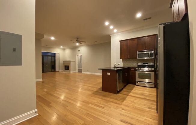 Open concept layout with gorgeous wood flooring - 3 Bedroom
