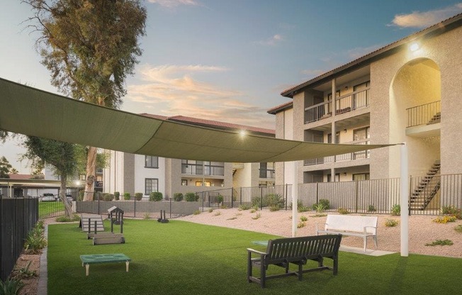 a rendering of a building with a courtyard and benches