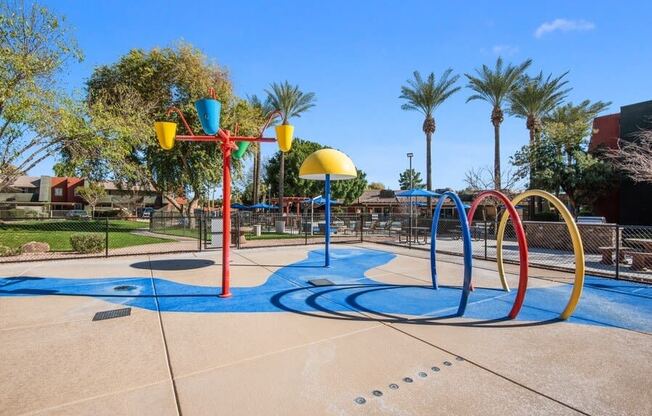 Playground area with basketball hoops at Saratoga Ridge, Phoenix, Arizona