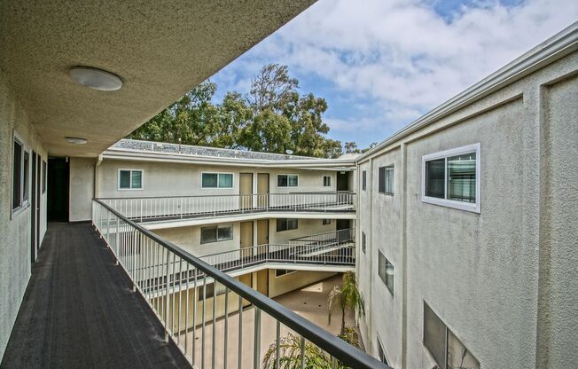 Bright & Spacious, Top-Floor 3BR3BA Condo w/ Spacious Deck w/ City Views, 2-Car Parking & In-Unit Laundry Next to Wilderness Park, Shopping, Schools, Park & Just 2 Mins to Beach!