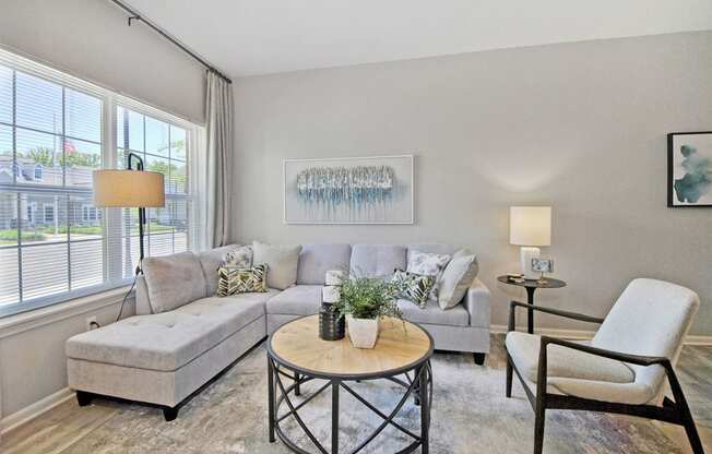 a living room with a couch and a table