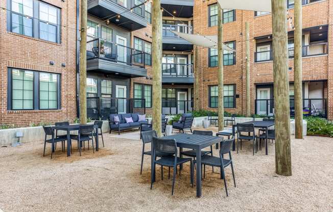 Outdoor Social Space with Comfortable Seating at St. Elmo Apartment in Austin, TX