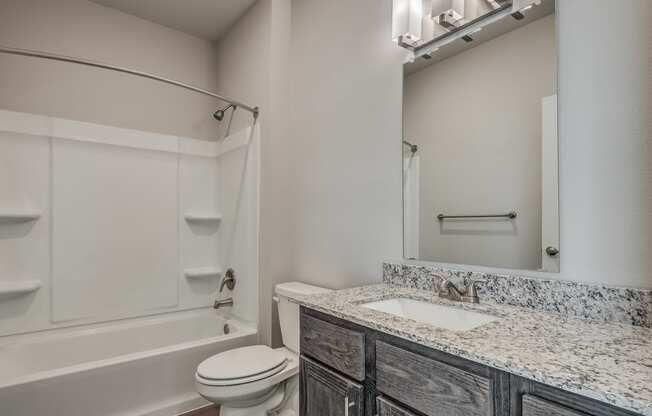 Bathroom With Granite Vanities