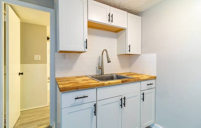 Upgraded white kitchen with cabinetry