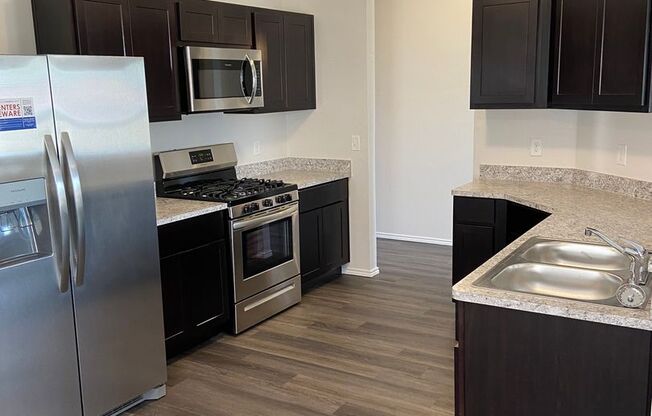 *Pre-leasing* Three Bedroom | Two Bathroom Home in Mustang Farms