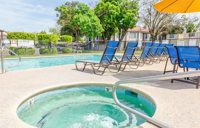 Luxurious Hot Spa & Pool with Lounges at River Oaks Apartments & Townhomes, Hanford, California