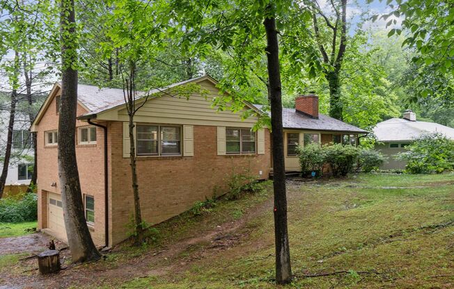 Large home on corner lot in Chesterbrook Woods, just minutes from Chain Bridge!