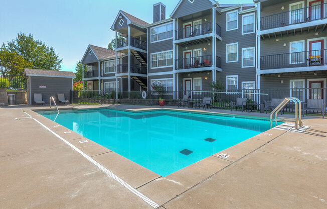 Resort-style swimming pool at Villas at Bailey Ranch Apartments, Oklahoma