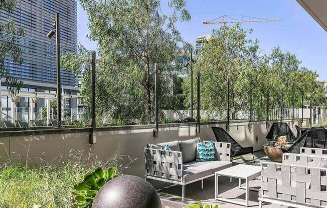 lush green patio lounge area at K1 Apartments, San Diego, CA