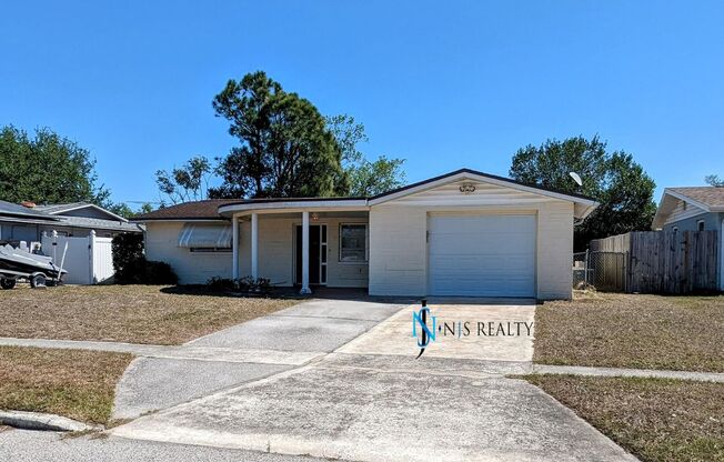 Gorgeous 2/1/1 1100 Sq. Ft. with HUGE kitchen/great room combo, tile floors throughout, BONUS ROOM & a fenced in yard!!!!