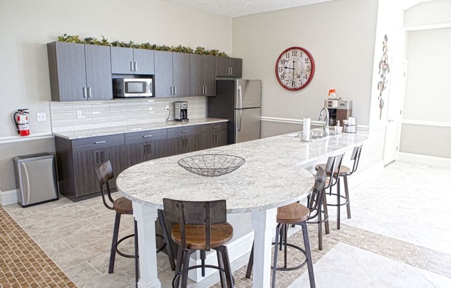 Clubhouse Kitchen with Large Breakfast Bar at Andover Pointe Apartment Homes, Nebraska, 68138