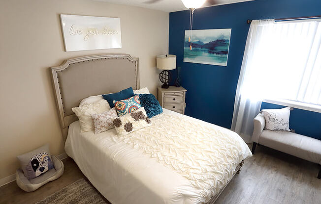 bedroom with overhead light and a window