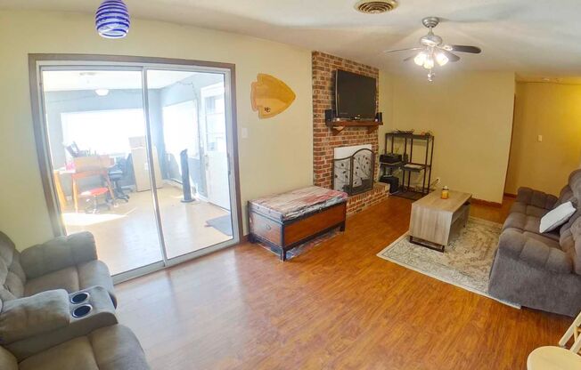 3D Tour Available-Spacious Home Near Bill Synder Stadium! Fenced-in Yard + Attached Garage + Washer & Dryer! Available August 1st!