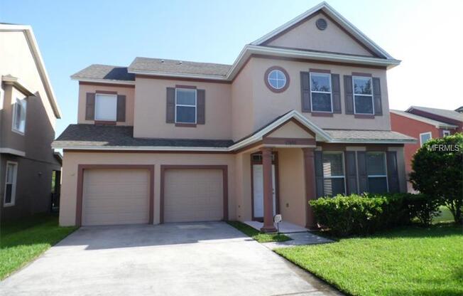 Beautiful 4/2.5 Lakes of Windermere home with open floor plan & lake access!