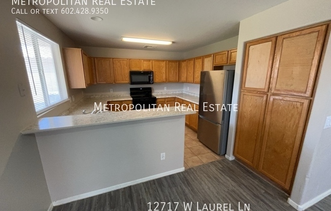 12717 W LAUREL LN