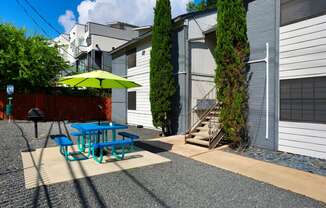 outdoor picnic area with grill