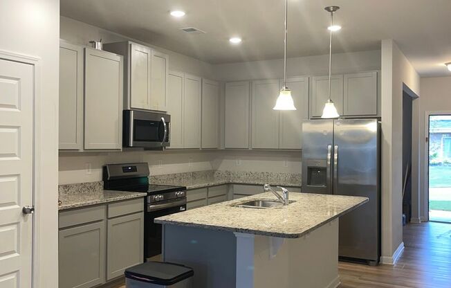 Great 3 Bed 2 Bath Brick Ranch in Brand New Community!