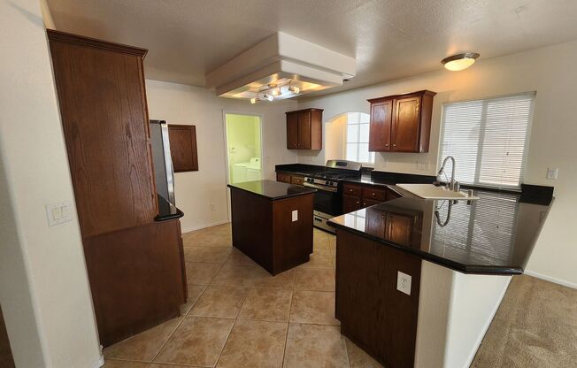 3-Bed, 2.5-Bath Pet-Friendly Home with Fenced Yard in Las Vegas