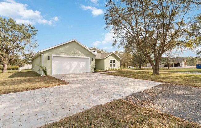 MOVE IN SPECIAL- Beautiful Brand New 4/2 Home on 3/4 Acre For Rent in St. Cloud