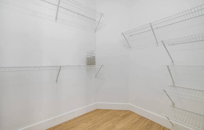 Empty white shelving unit in a room.