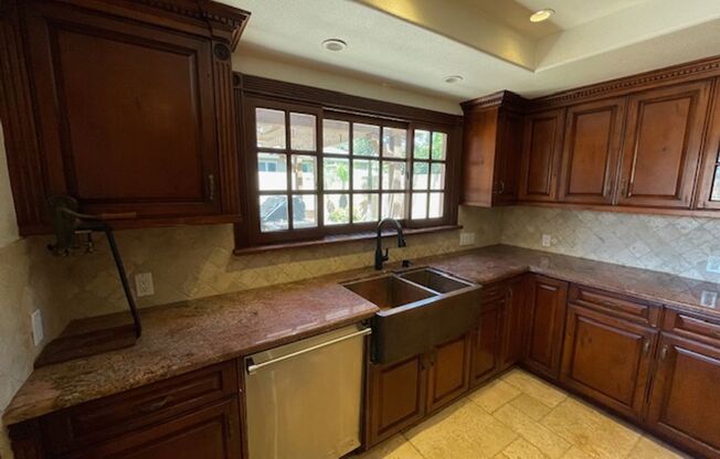 Spacious 4 Bedroom Oxnard Home with Custom Kitchen and More
