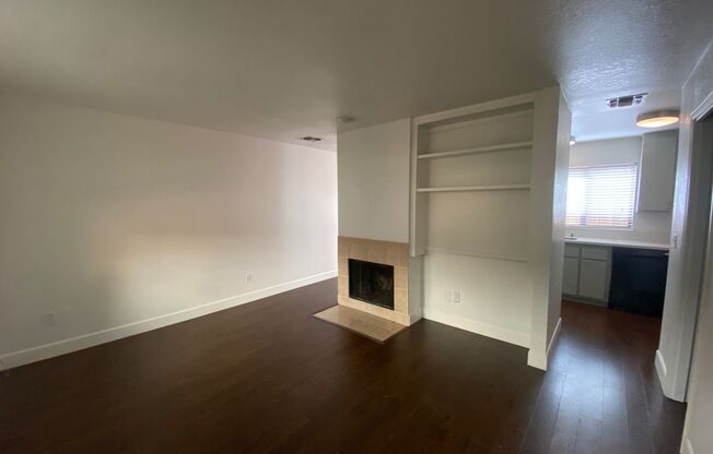 Updated Midtown 2 Bedroom Townhouse in Gated Community with Off-Street Parking