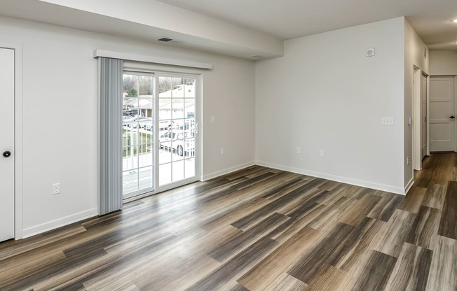 New building with white and dark color schemes with one, two and three bedroom apartment homes at CopperCreek Apartments in Council Bluffs, IA