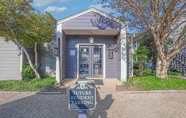 Front view of the leasing office with sign that says Future Resident Parking at Laurel Parc apartments in Shreveport, LA.