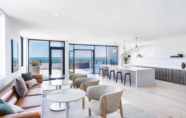 A bright, open gathering space with ocean views and room to host, unwind, or connect.