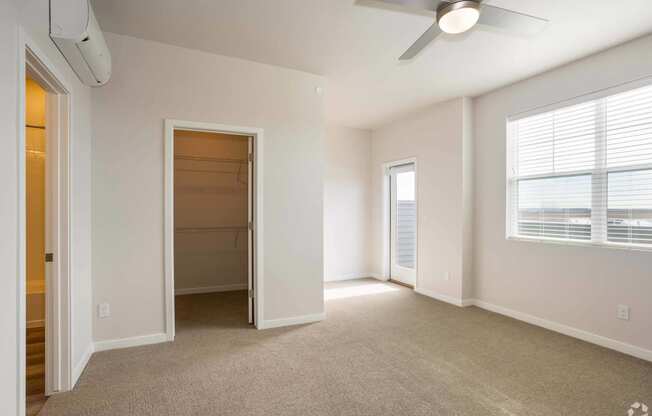 bedroom with carpet and large closet at Palisade Park Townhomes, Colorado, 80023